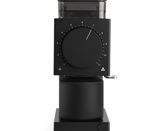 Black coffee grinder on a white background